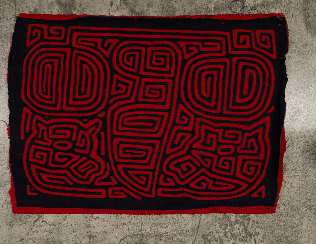 Black And Red Machete And Dog Mola