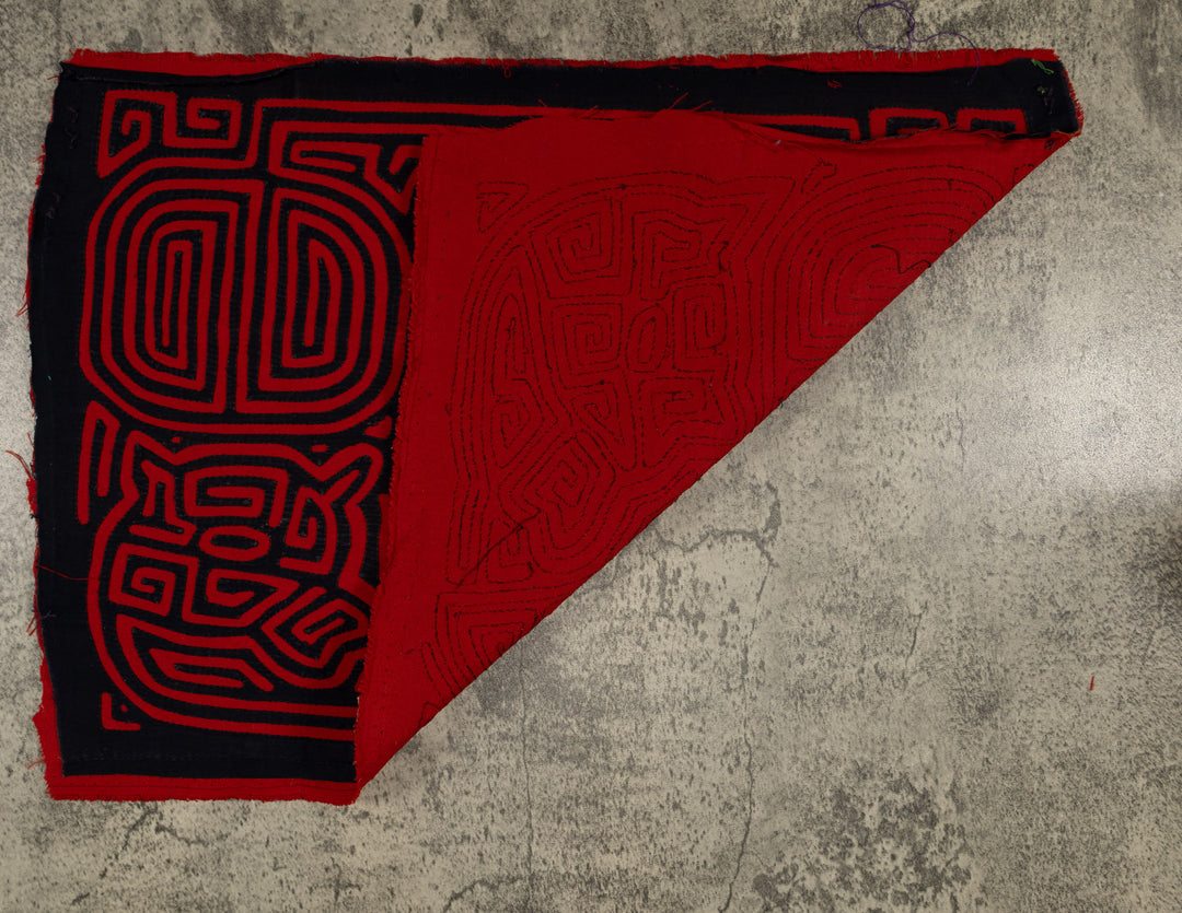 Black And Red Machete And Dog Mola