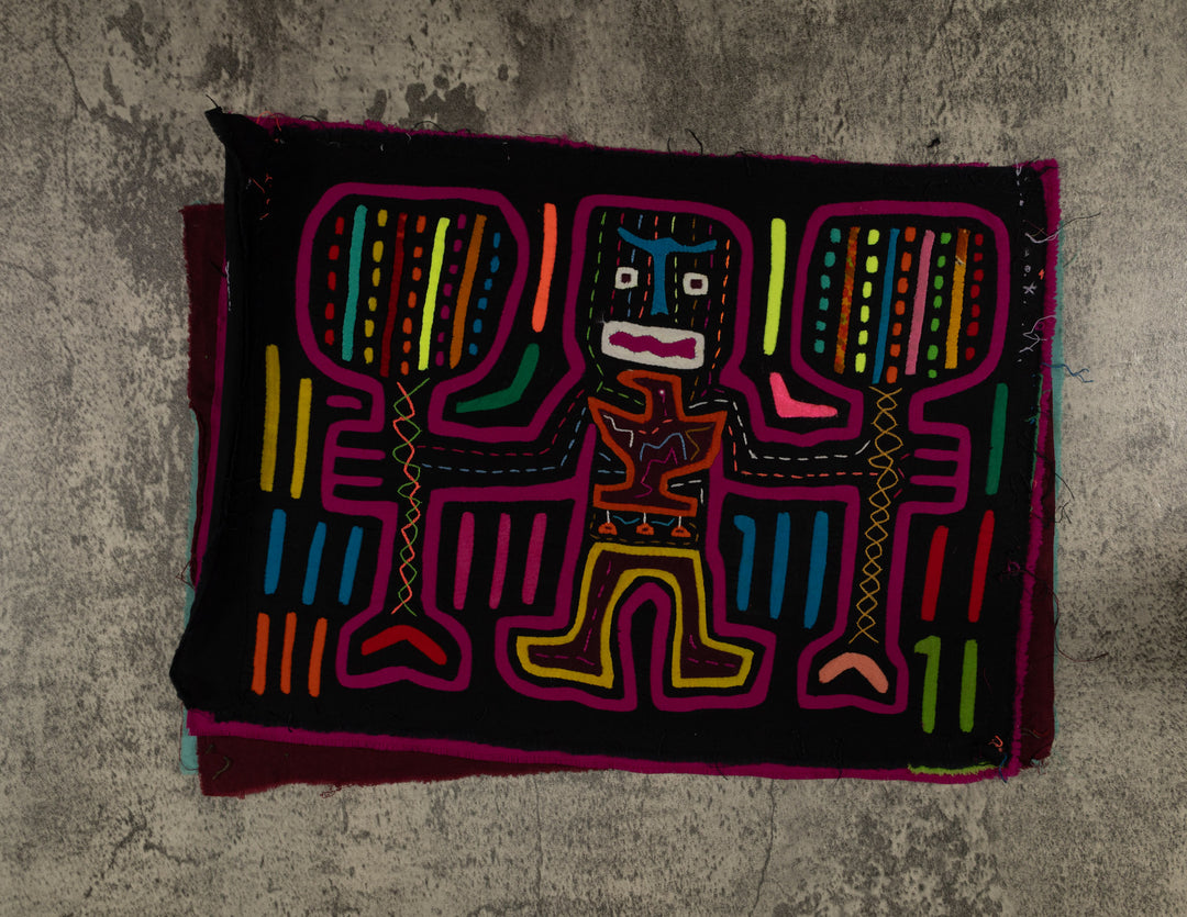 Classic Black And Purple Cayuco Paddle Man Mola