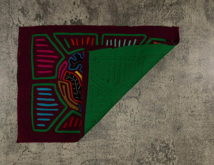 Burgundy And Green Puppy Dog In Action Mola