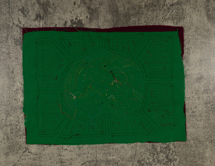 Burgundy And Green Puppy Dog In Action Mola