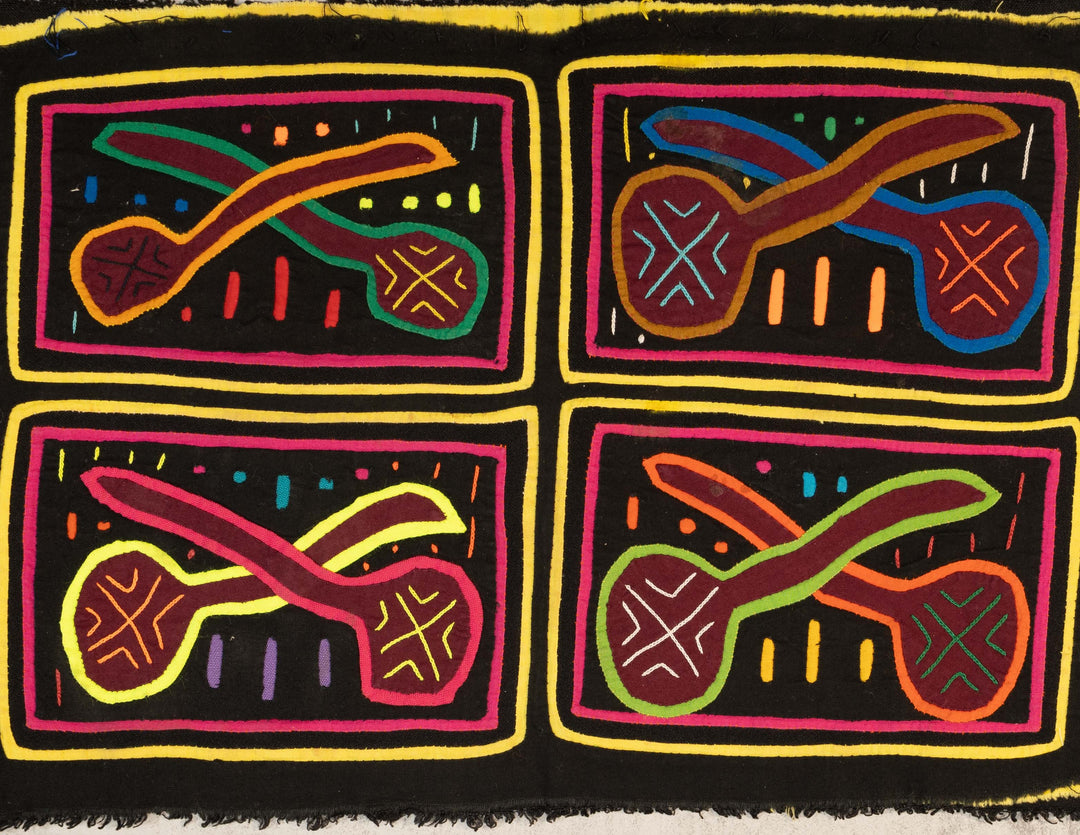 Black And Yellow Pipe Or Maraca Mola