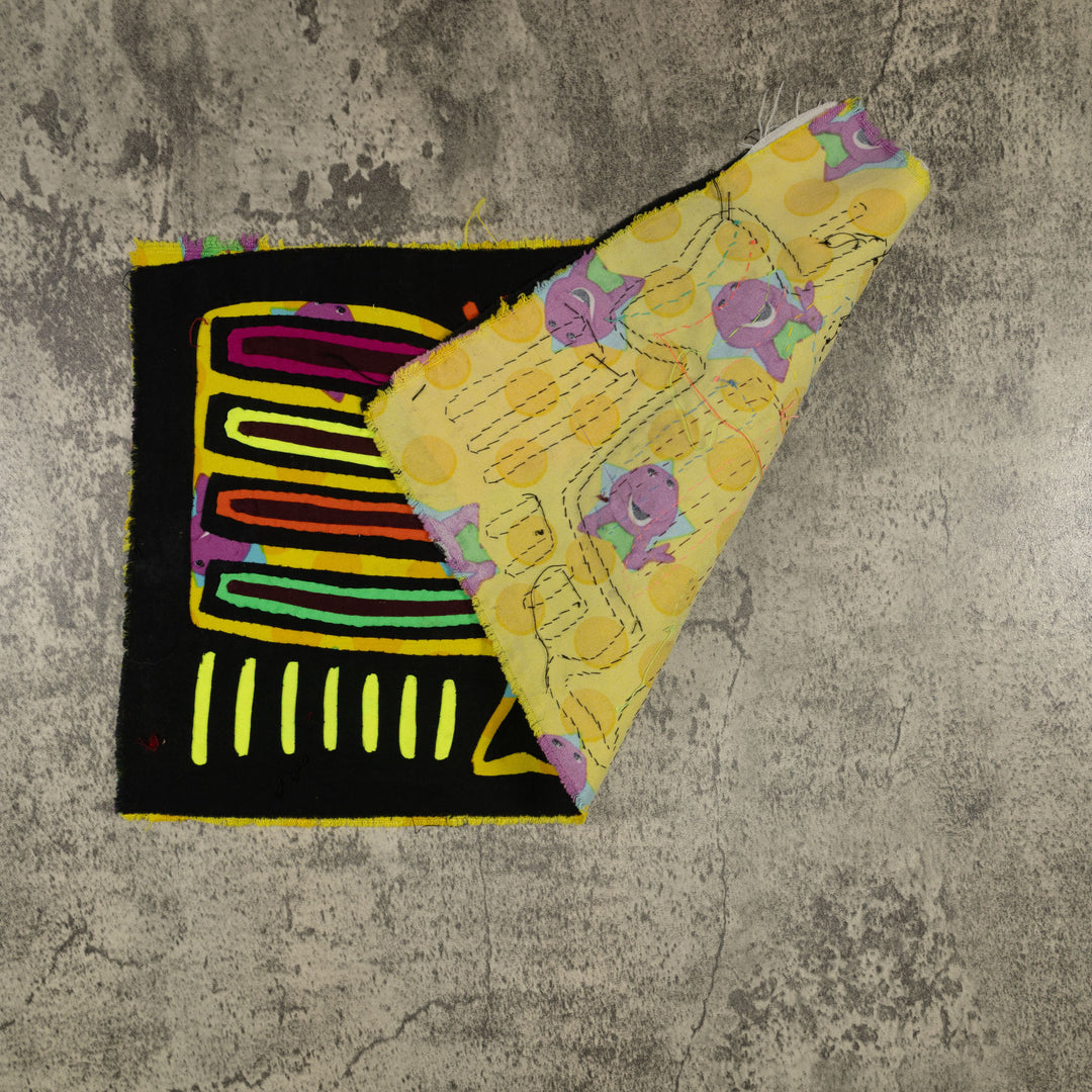Traditional Black And Yellow Bird Mola