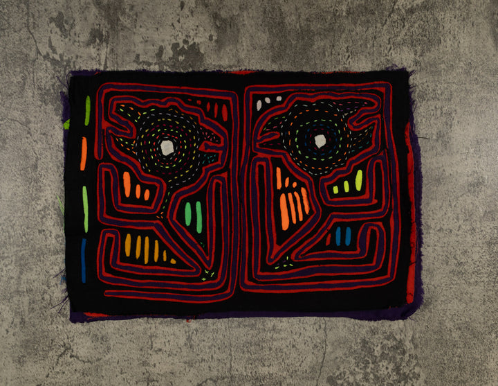 Black And Red Talking Out Of Both Sides Of Mouth Mola