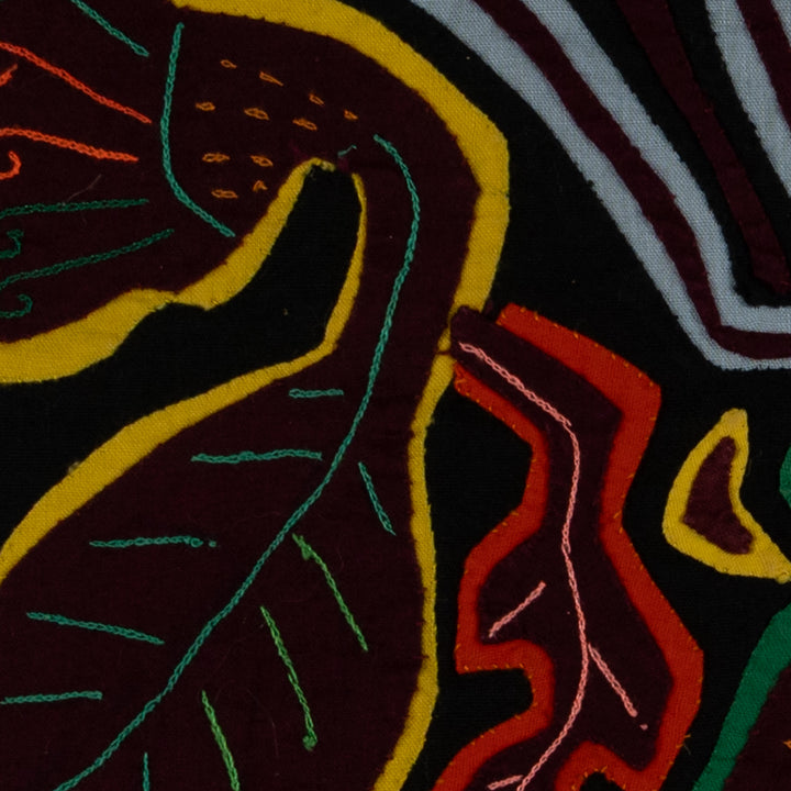 Panama mola panel, corner blocks of small colored crosses, hand stitched reverse applique