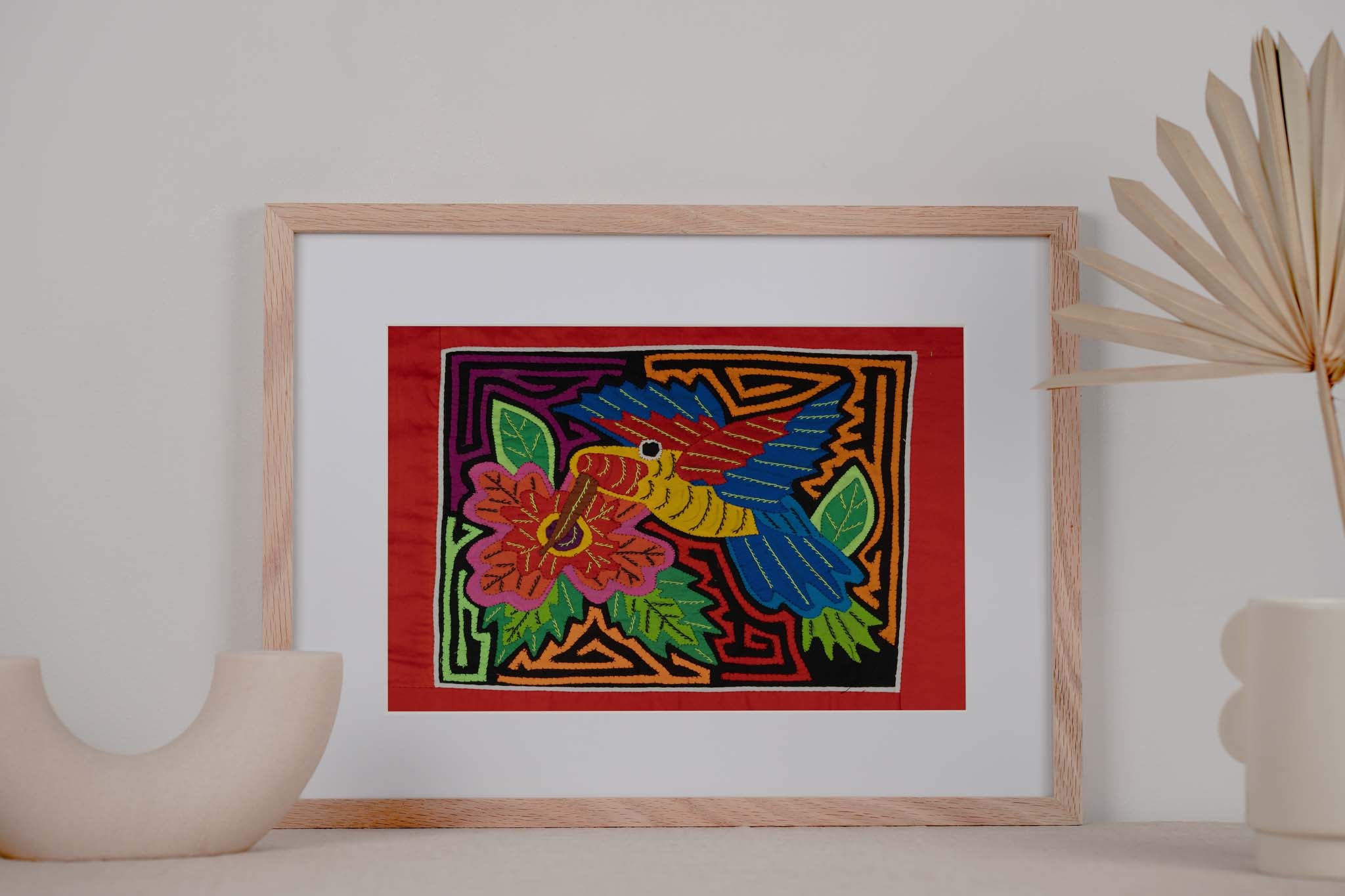 Red Blue And Yellow Hummingbird With Flower Mola