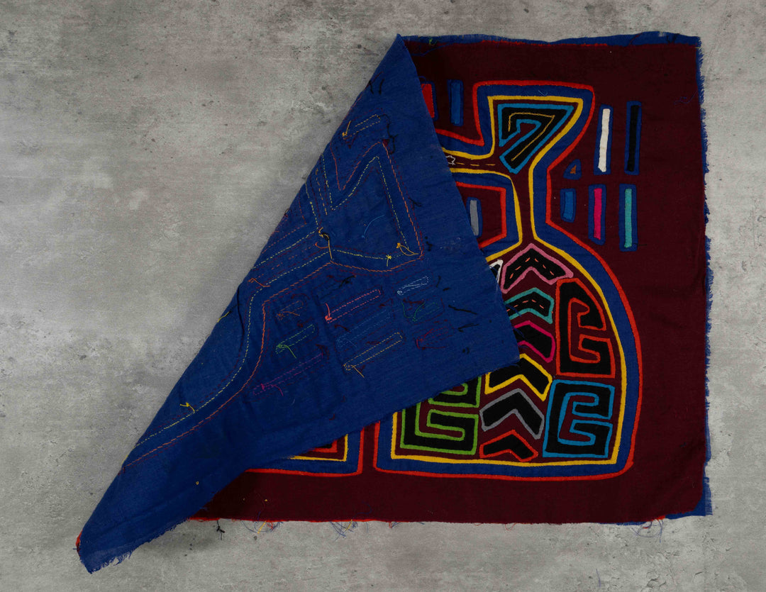 Burgundy Orange And Blue Cayuco Paddle Mola