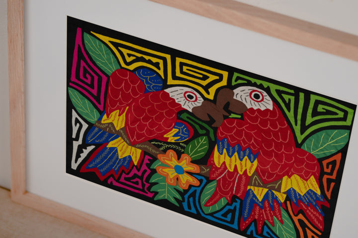 Two Bright Red Macaw Parrot Bird Mola