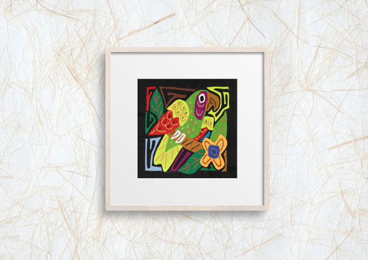 Panama molita, a white crowned parrot with a red wing on black, hand stitched reverse applique
