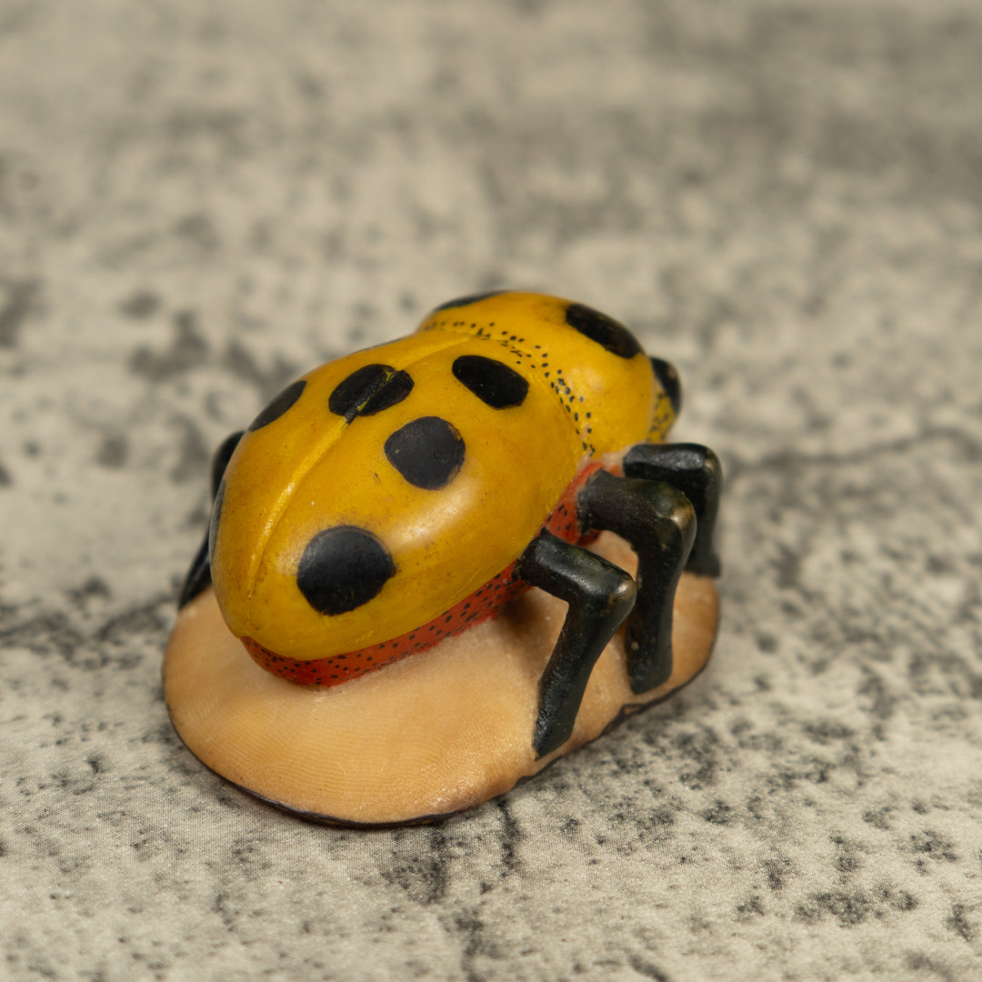 Vintage Black And G9old Insect Bug Tagua Carving