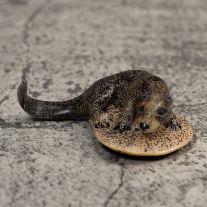 Black And Speckled River Otter Tagua Carving