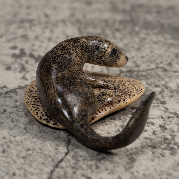Black And Speckled River Otter Tagua Carving