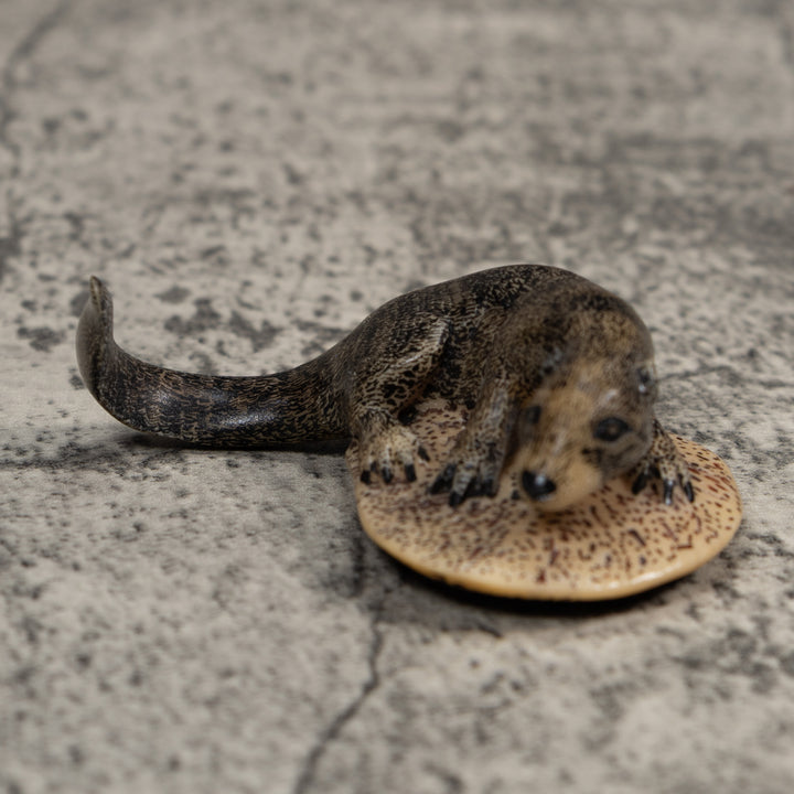 Black And Speckled River Otter Tagua Carving