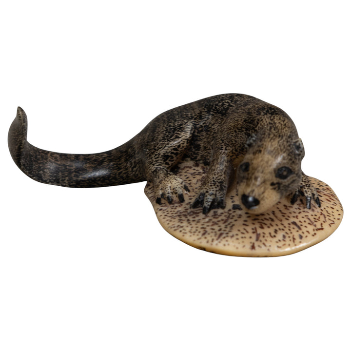 Black And Speckled River Otter Tagua Carving