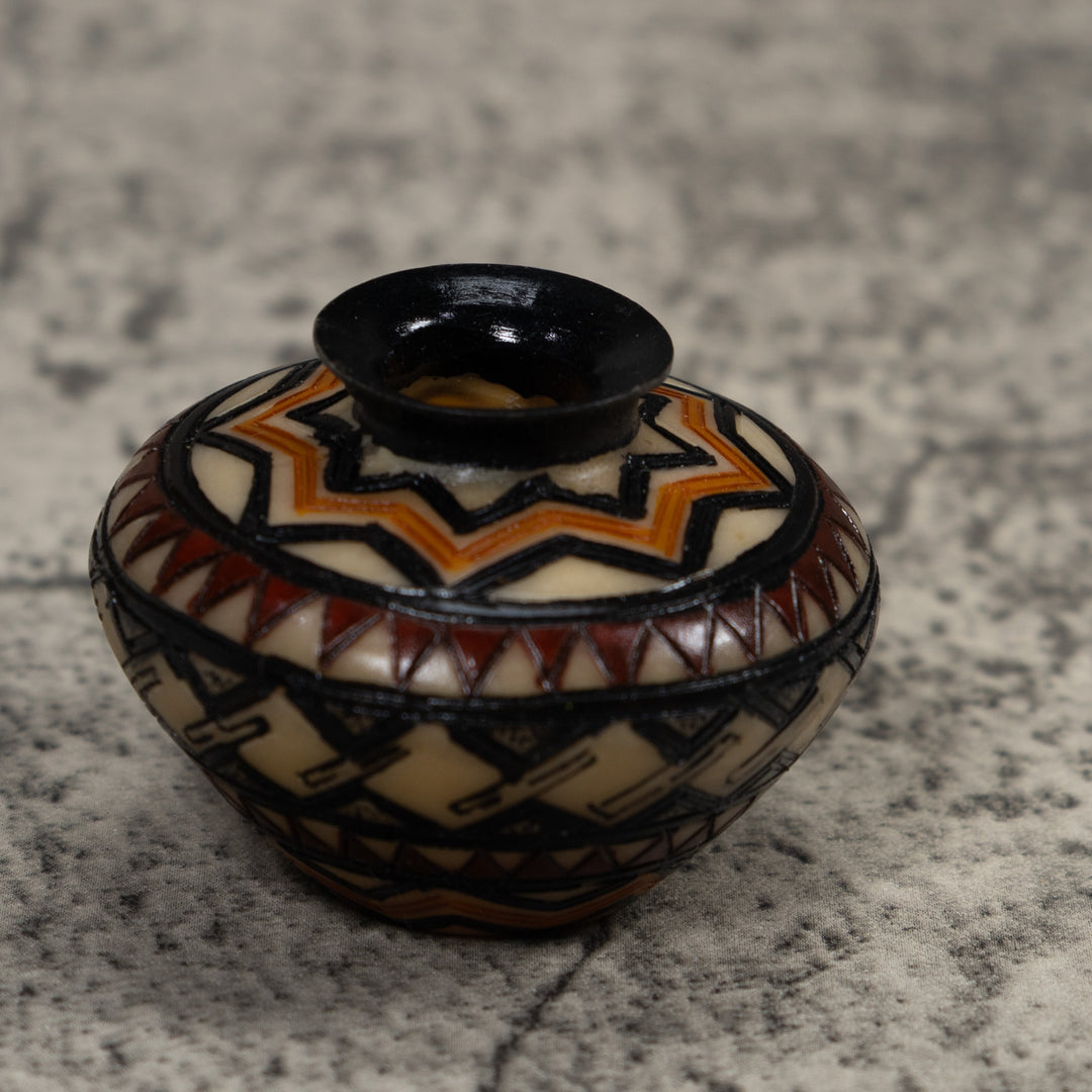 Painted Tagua Vase Carving
