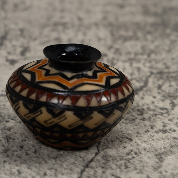 Painted Tagua Vase Carving