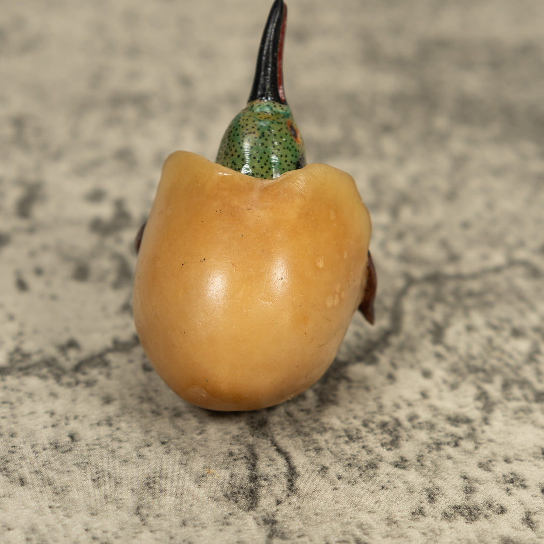 Vintage Seed Eater Bird Emerging From Egg Tagua Carving