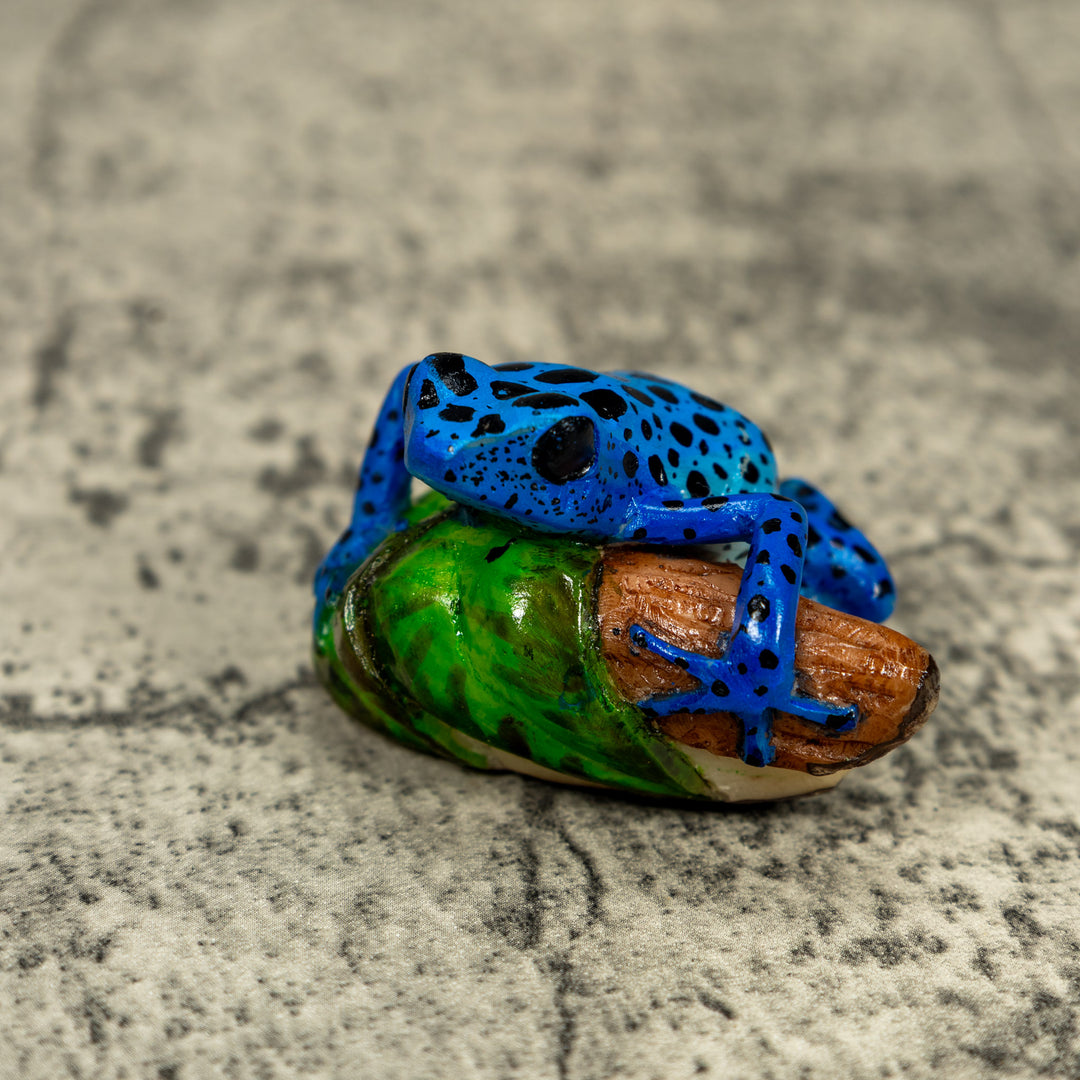 Blue And Black Poison Dart Frog On Log Tagua Carving