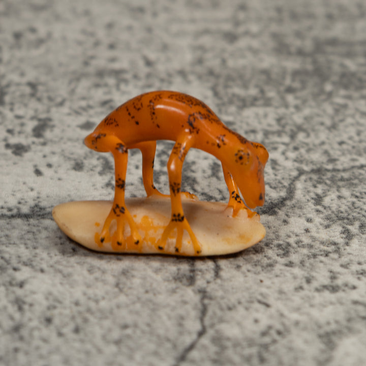 Orange And Black Undercut Frog Tagua Carving