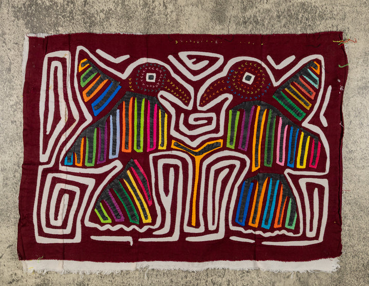 Maroon And White Two Bird In flight Mola