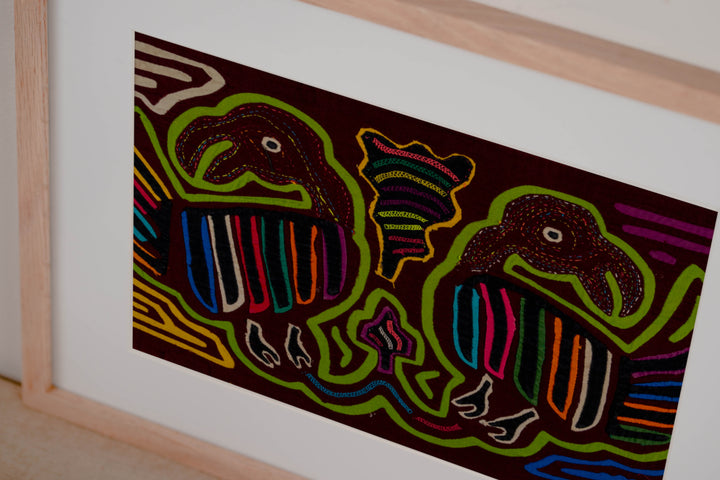 Maroon And Green Buzzard Bird Mola