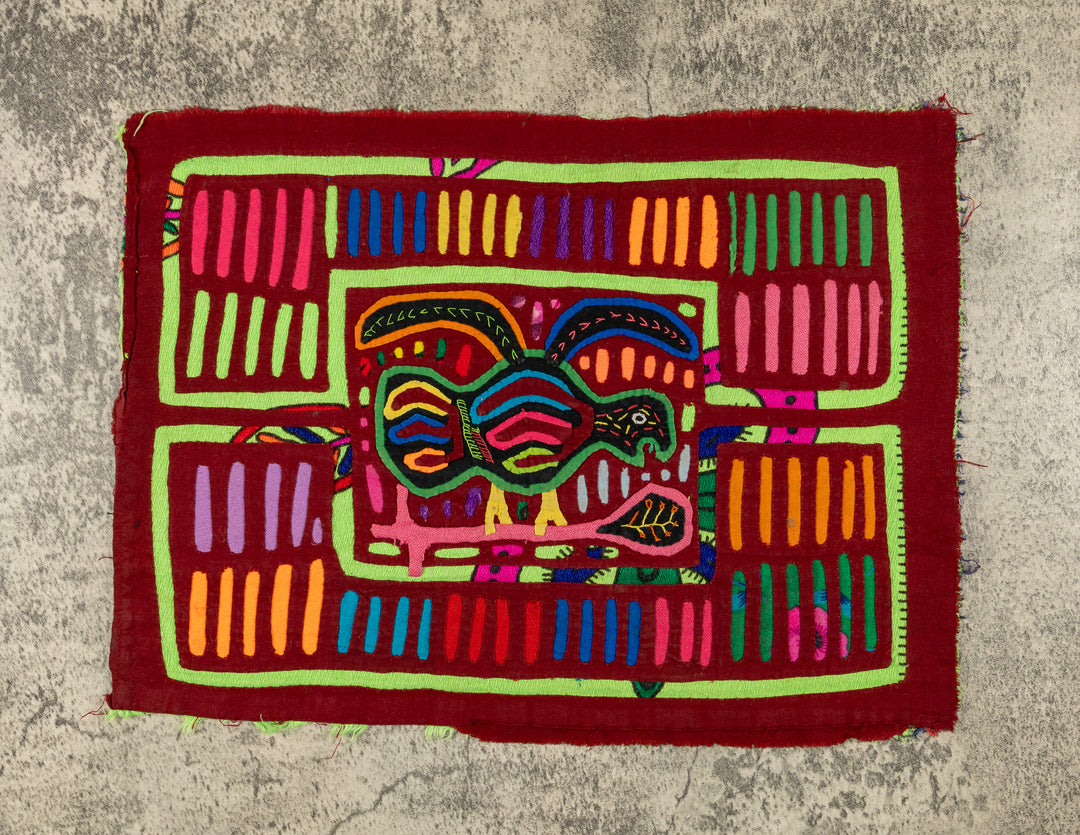 Burgundy And Green Winged Warrior Mola