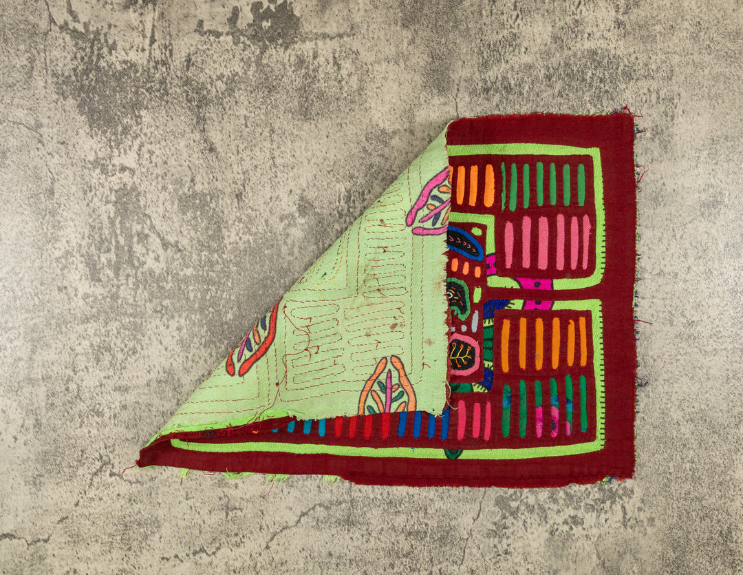 Burgundy And Green Winged Warrior Mola