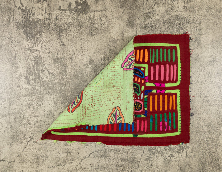 Burgundy And Green Winged Warrior Mola