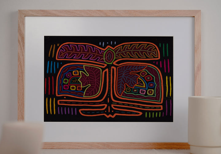 Hand stitched Guna mola from Guna Yala Panama, small colored bars running down both sides