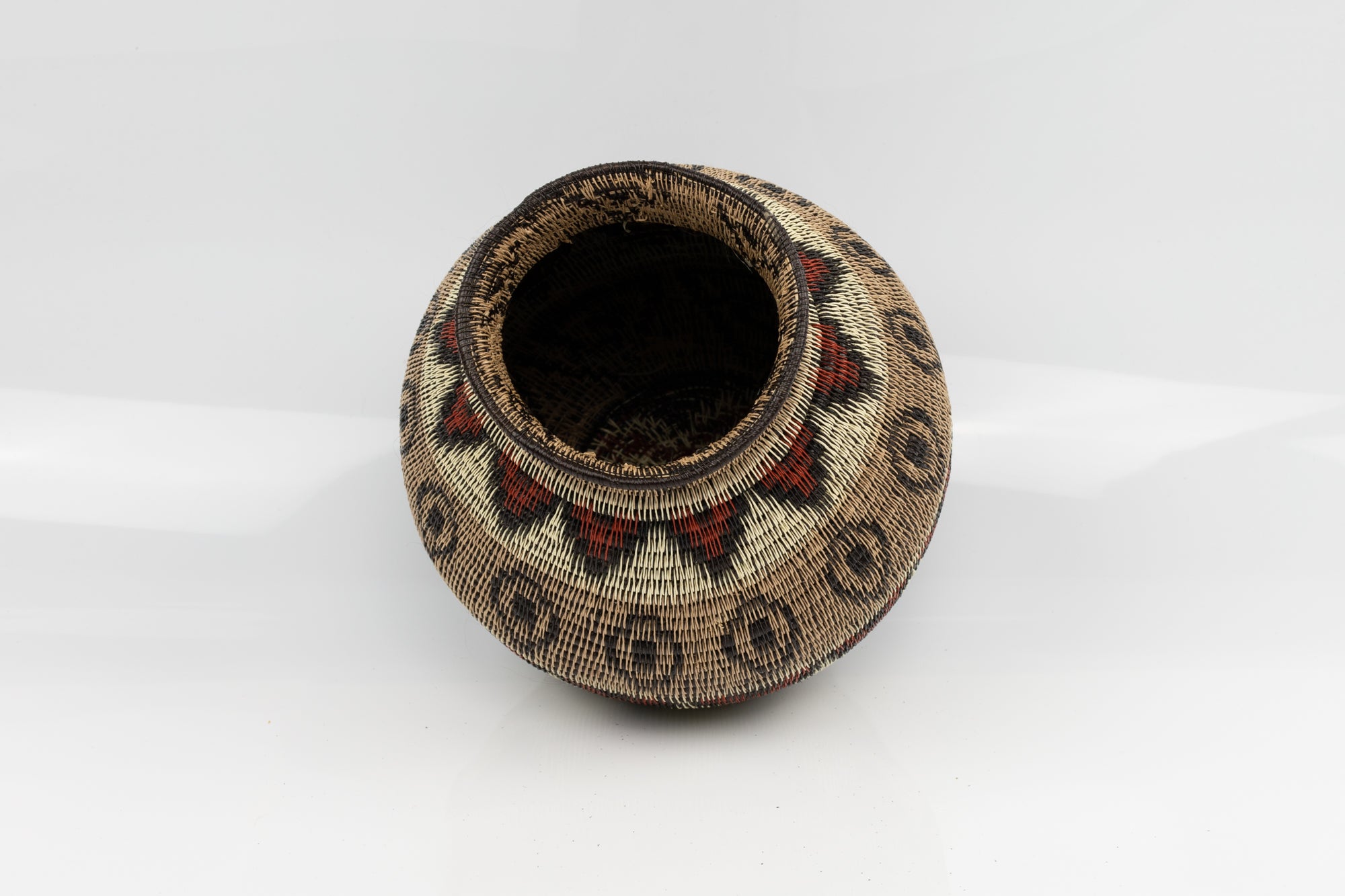Panama Indian feather Wounaan basket. brown, red, White. Hand woven.