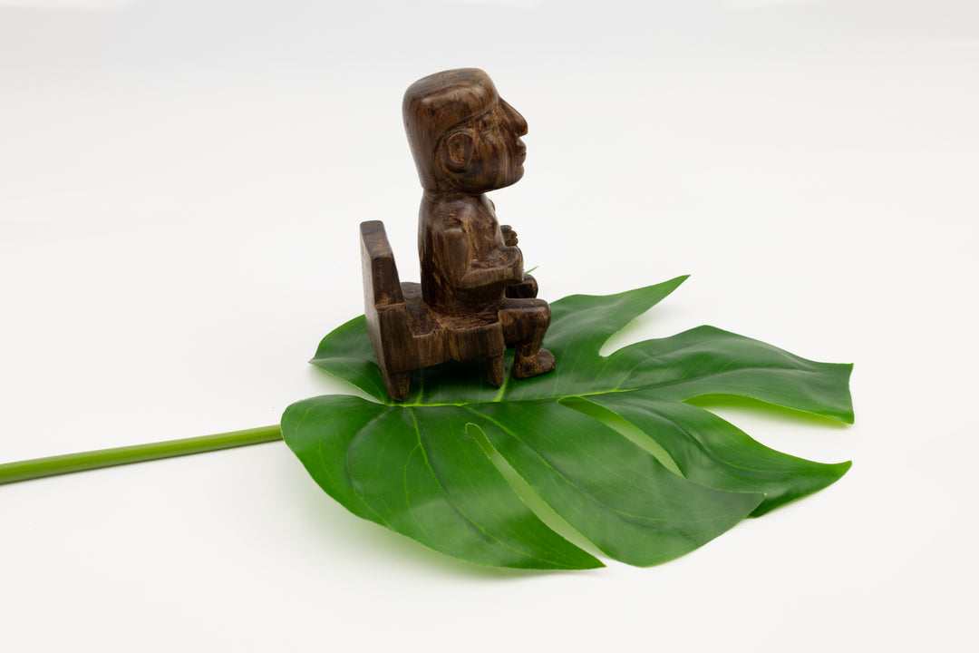 Hand Carved Cocobolo Wood Figure in Chair Sculpture