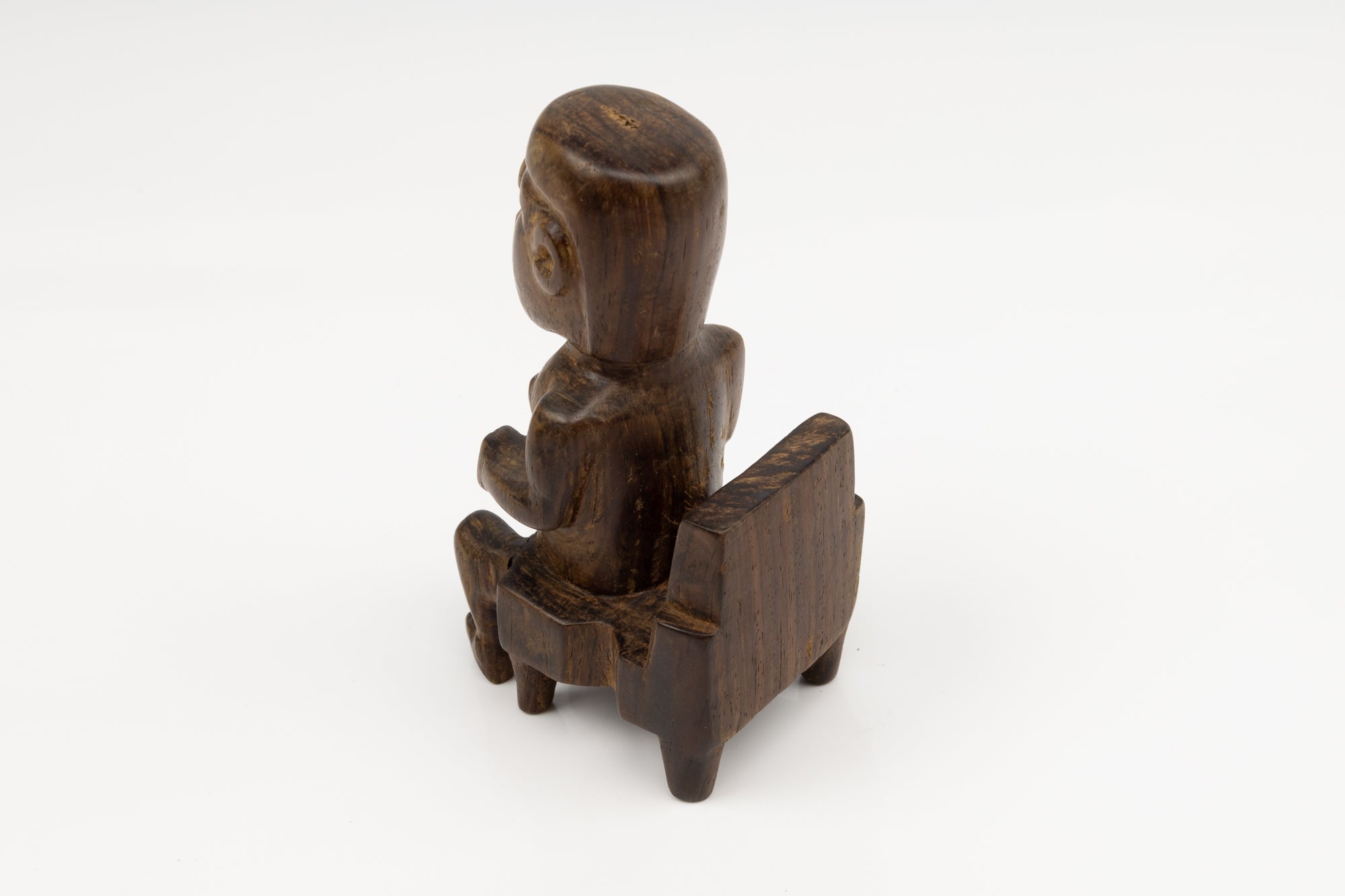 Hand Carved Cocobolo Wood Figure in Chair Sculpture