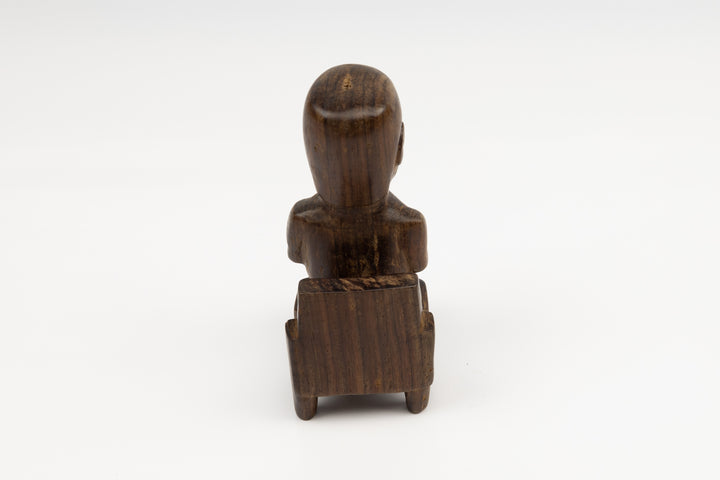 Hand Carved Cocobolo Wood Figure in Chair Sculpture
