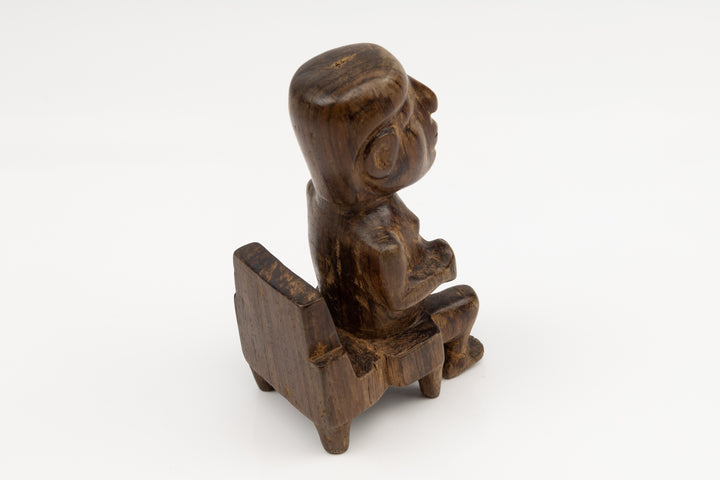 Hand Carved Cocobolo Wood Figure in Chair Sculpture