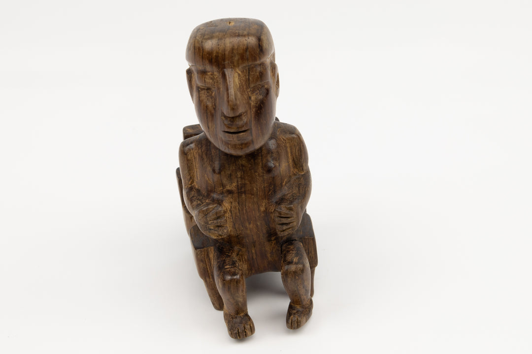 Hand Carved Cocobolo Wood Figure in Chair Sculpture