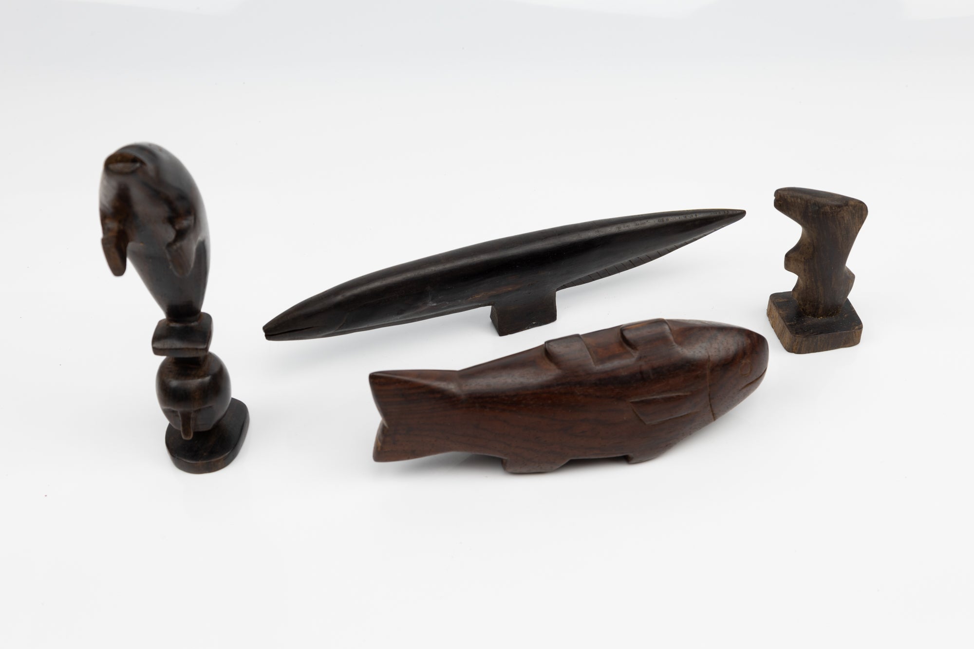 Hand Carved Cocobolo Wood Sculpture Collection