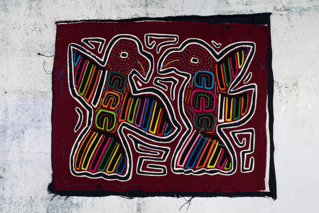 Burgundy And White Aerial Combat Bird Mola