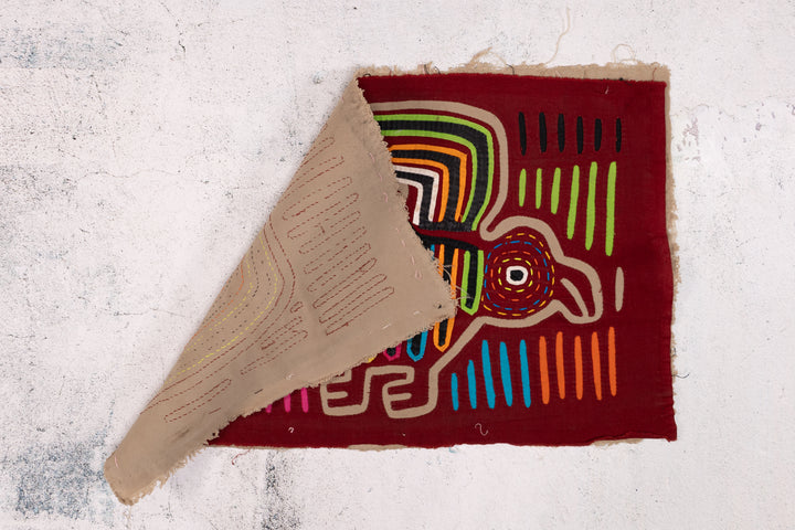 Maroon Rainbow Bird in Flight Mola