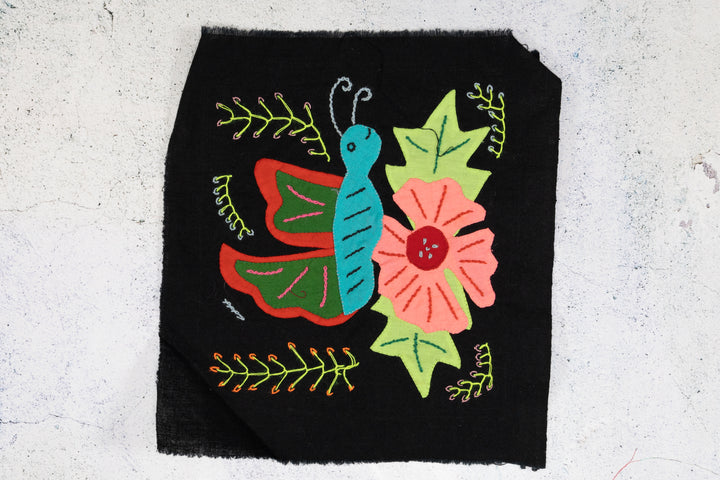 Blue And Red Butterfly with Orange Flower Molita