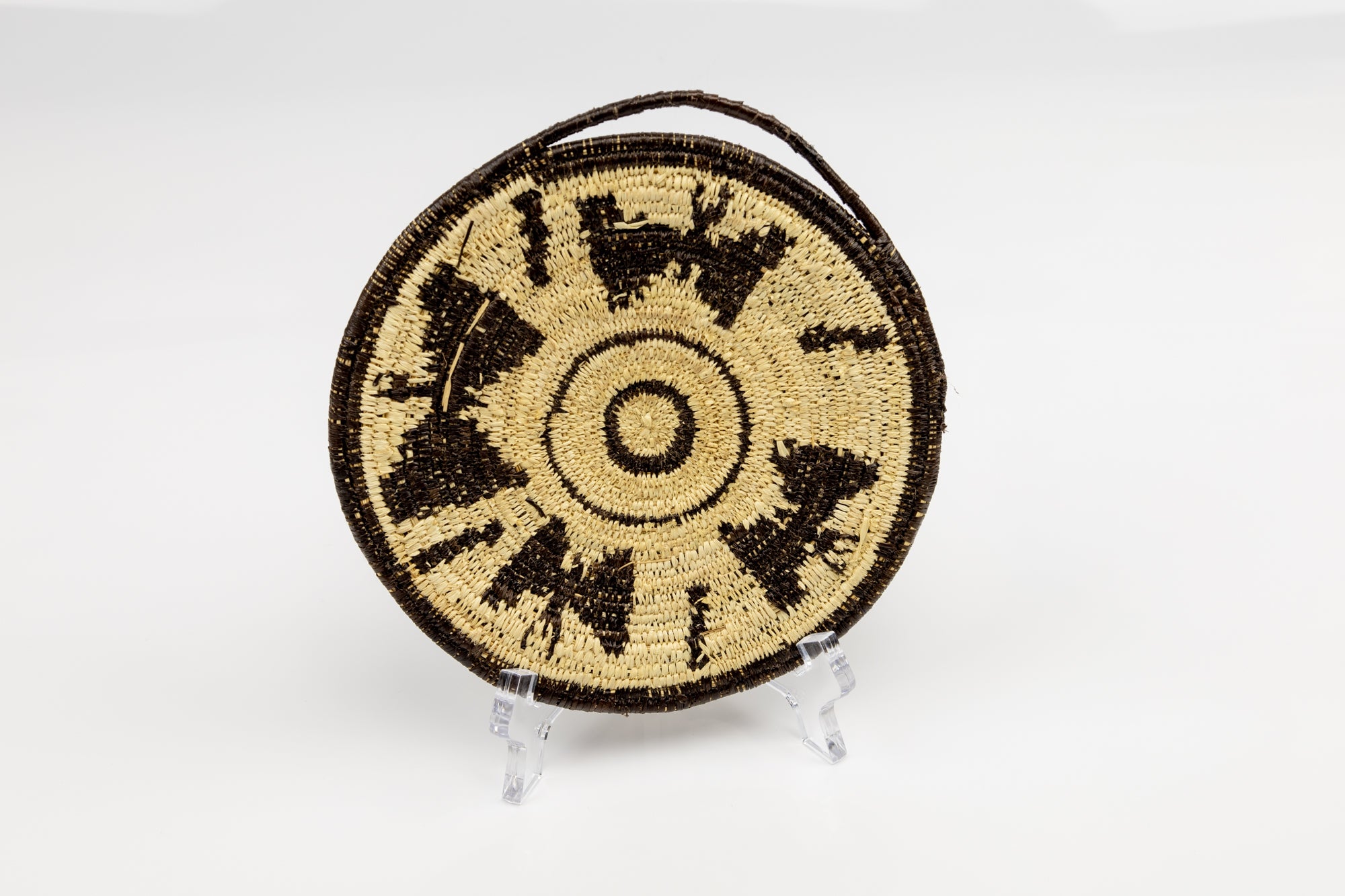Hand woven Butterfly plate basket from Panama. Black and white colors. Loop for hanging. Wall decoration. Indigenous artists Panama.