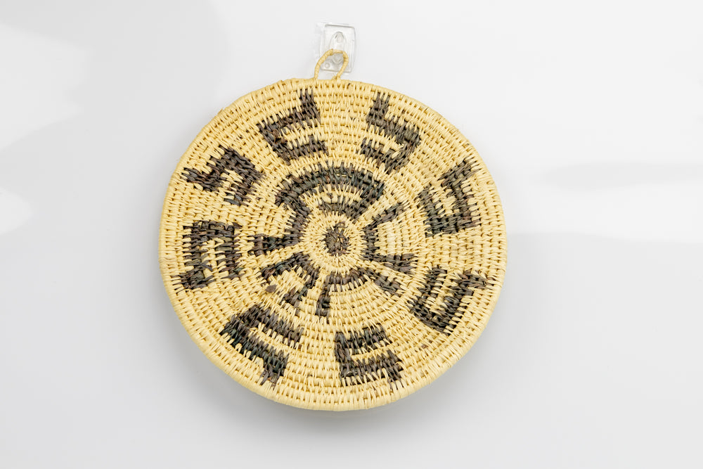 Hand woven plate basket from Panama. gray and white colors. Wall decoration. Indigenous artists Panama.