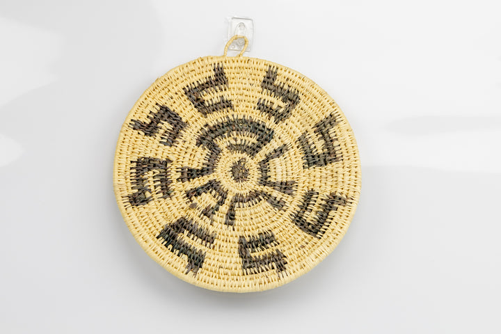 Hand woven plate basket from Panama. gray and white colors. Wall decoration. Indigenous artists Panama.