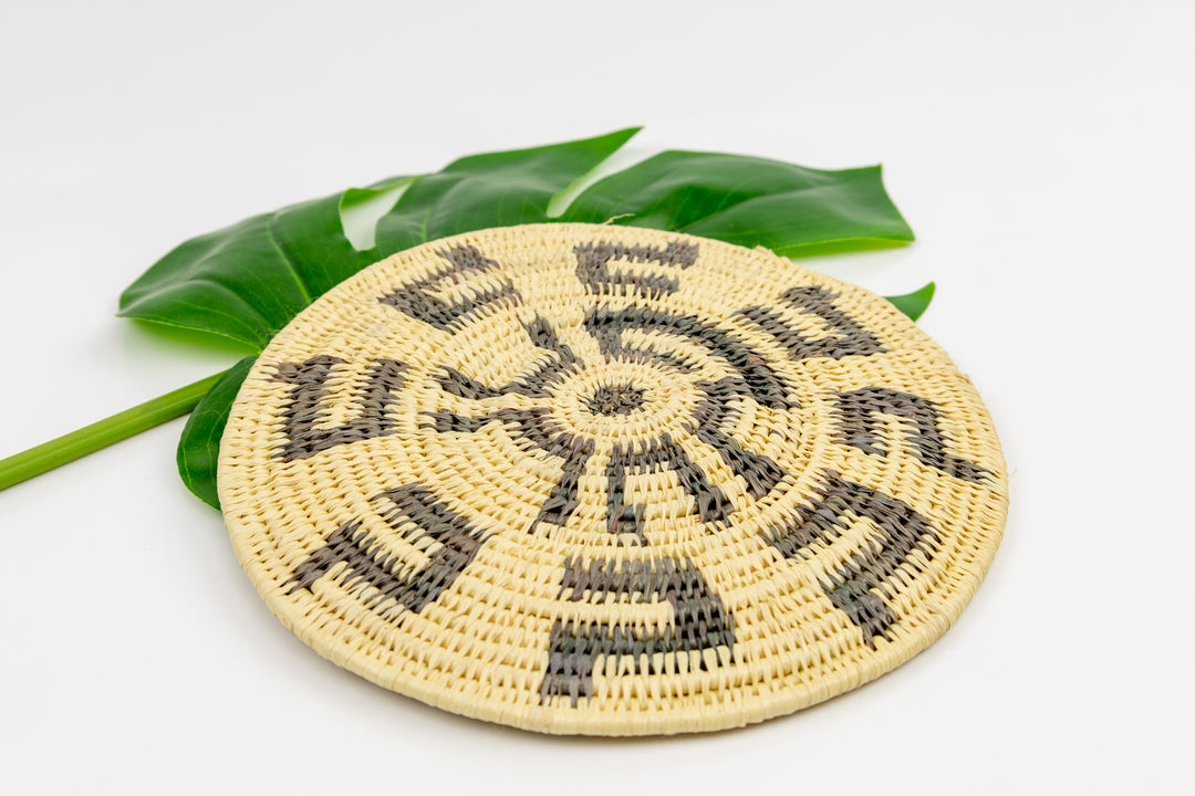 Hand woven plate basket from Panama. gray and white colors. Wall decoration. Indigenous artists Panama.