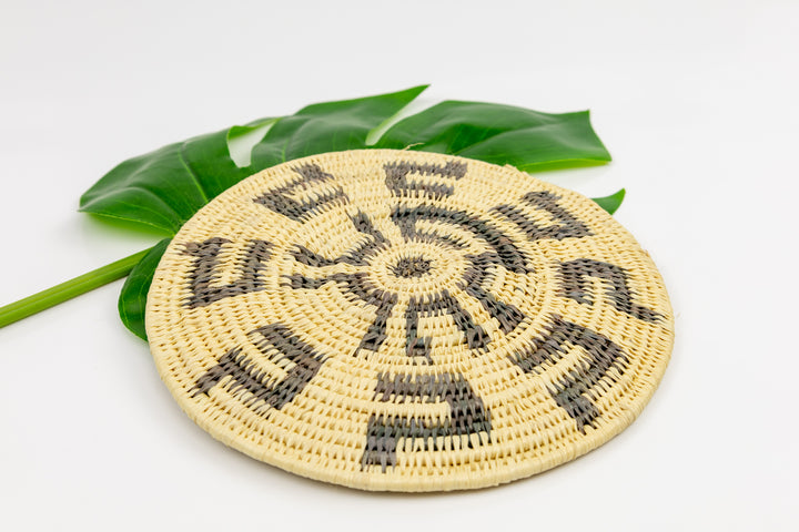 Hand woven plate basket from Panama. gray and white colors. Wall decoration. Indigenous artists Panama.
