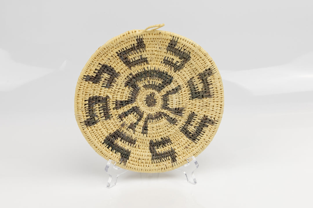 Hand woven plate basket from Panama. gray and white colors. Wall decoration. Indigenous artists Panama.