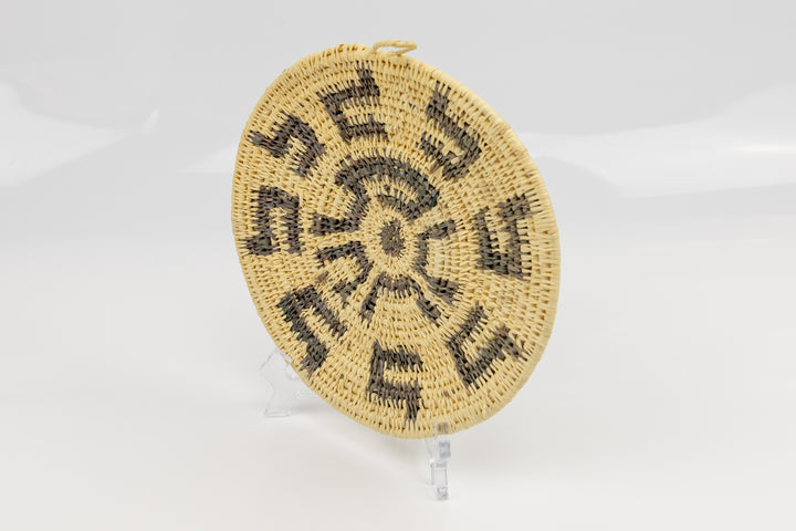Hand woven plate basket from Panama. gray and white colors. Wall decoration. Indigenous artists Panama.