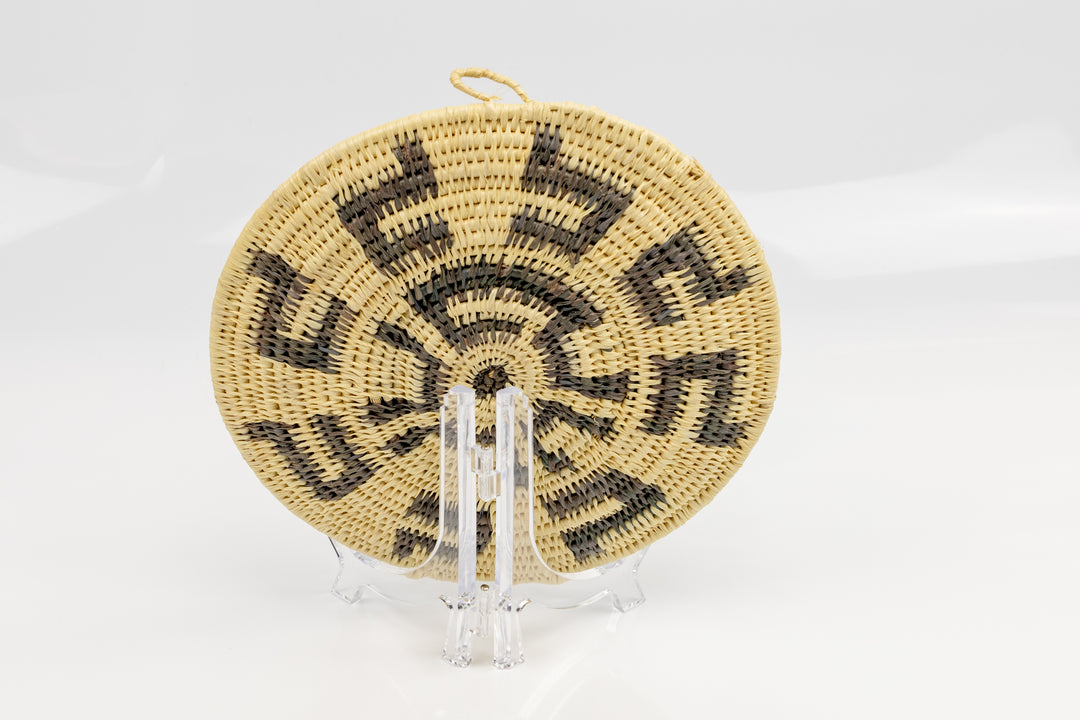 Hand woven plate basket from Panama. gray and white colors. Wall decoration. Indigenous artists Panama.