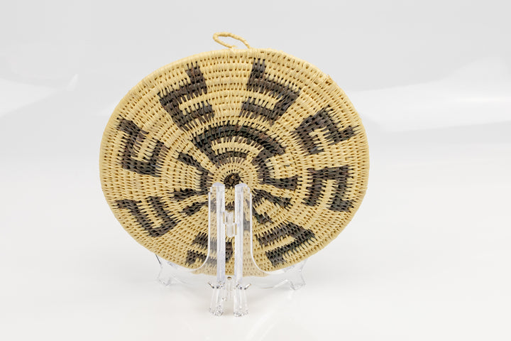 Hand woven plate basket from Panama. gray and white colors. Wall decoration. Indigenous artists Panama.