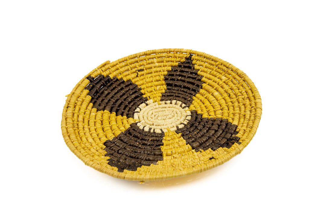 Gold, brown and white. Hand woven plate basket from Panama. Sambu village near Colombia.