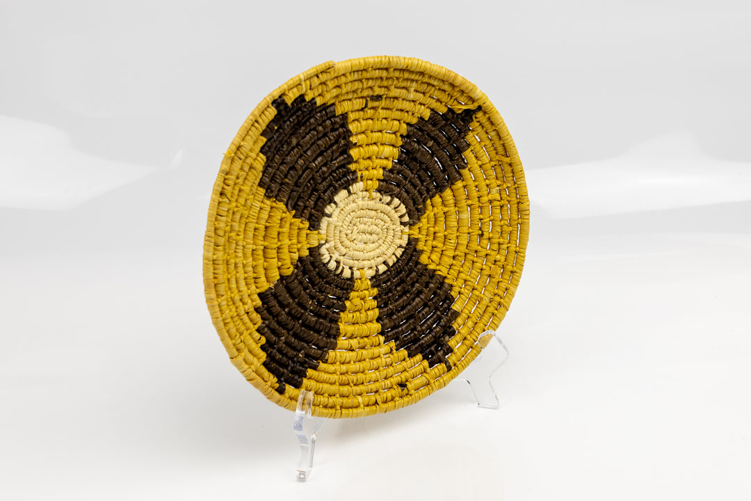 Gold, brown and white. Hand woven plate basket from Panama. Sambu village near Colombia.
